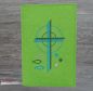 Preview: Gotteslobhülle in maigrün, Kreuze, Kreise, Fische