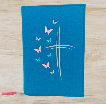 Gotteslobhülle in petrol, Kreuze, Schmetterlinge