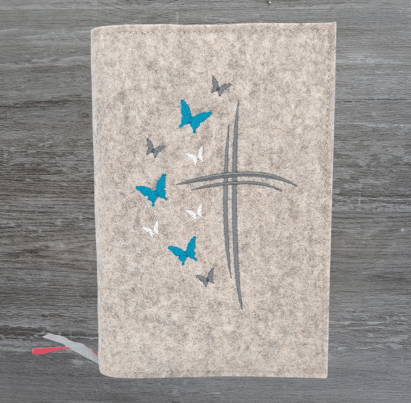 Gotteslobhülle in beige meliert, Kreuze, Schmetterlinge